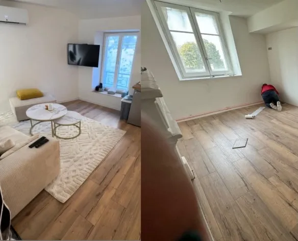 Le même séjour après travaux : sol stratifié posé avec plinthes, pièce meublée et habitable